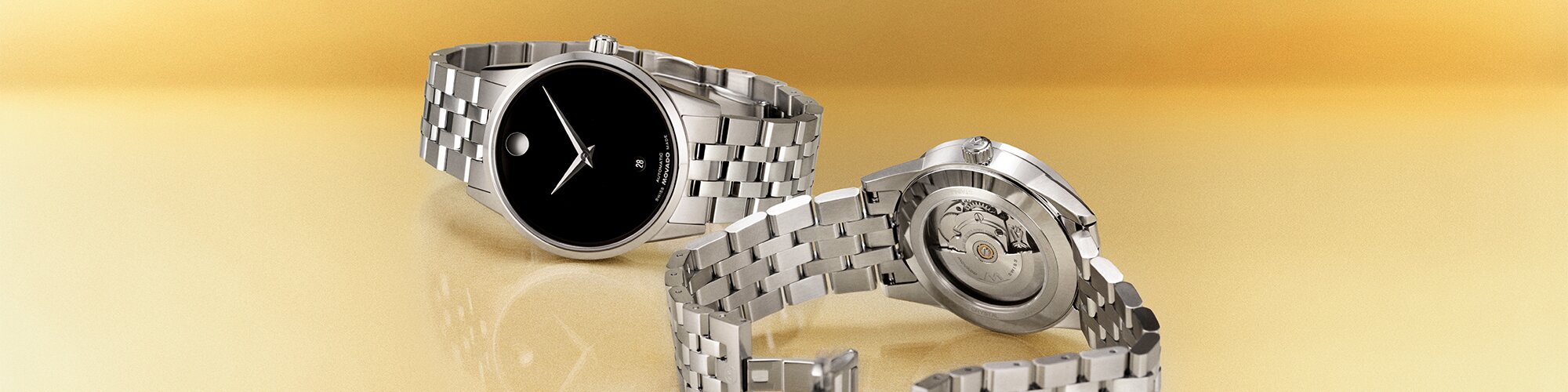 Back of a black PVD watch with exposed caseback that shows the automatic movement