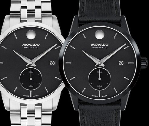 Museum Taga watch with stainless steel bracelet and black dial next to Museum Taga with black leather strap and dial.