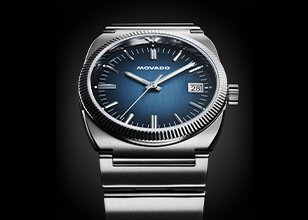 Heritage Ondoplan watch with stainless steel bracelet and blue dial.