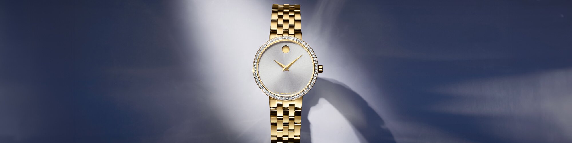 Museum Classic watch with gold tone bracelet and silver dial with lab grown diamond bezel
