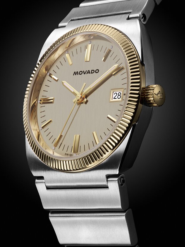 Heritage Ondoplan watch with stainless steel bracelet and gold tone dial.