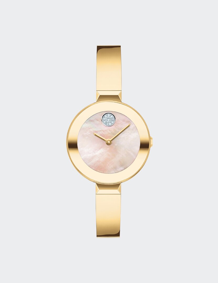 Gold tone BOLD Bangle watch with pink mother of pearl dial.