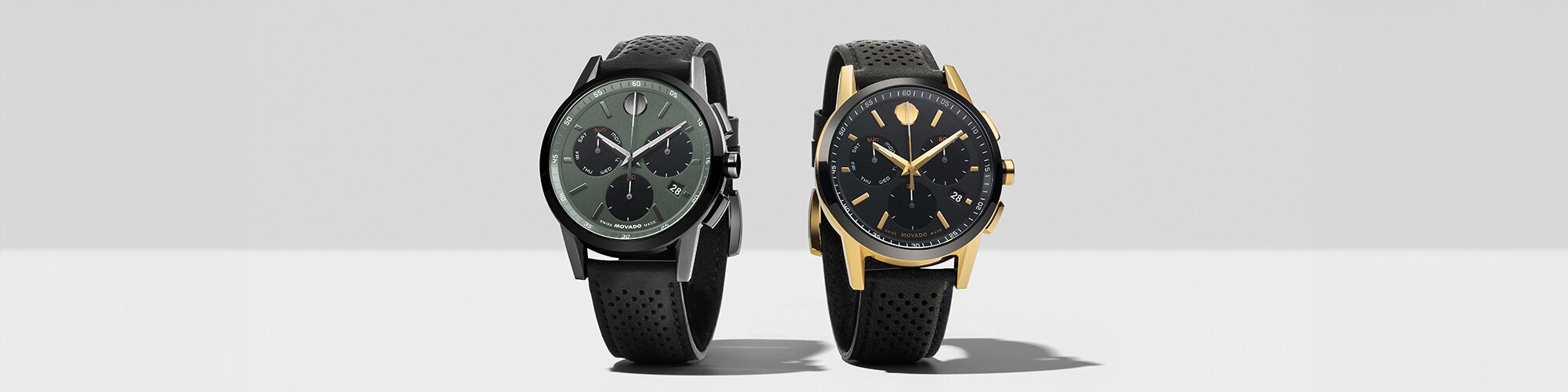 Museum Sport watch with black perforated leather strap and green chronograph dial next to Museum Sport watch with black perforated strap and black chronograph dial