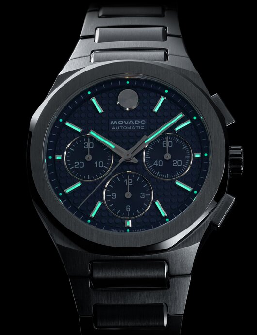 Swiss Super-LumiNova® accents glowing on the dial of the Alta Centurion Chronograph watch.