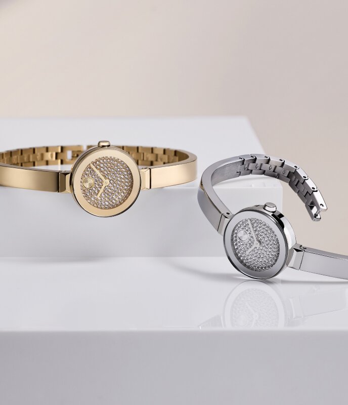 Gold tone BOLD Bangle Mini watch with crystal dial and stainless steel BOLD Bangle Mini watch with crystal dial.