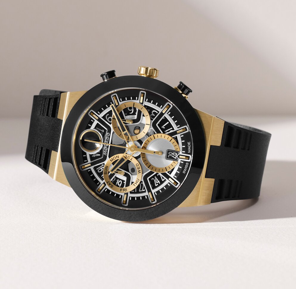 BOLD Fusion watch with black silicone strap and skeleton chronograph dial with gold tone and silver accents.