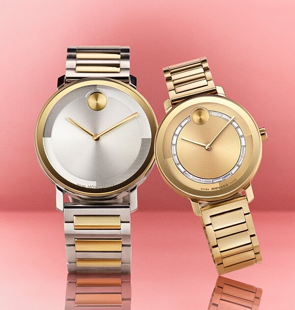 Two Tone BOLD Evolution 2.0 men's bracelet watch next to a women's gold tone BOLD Evolution 2.0 bracelet watch with crystals