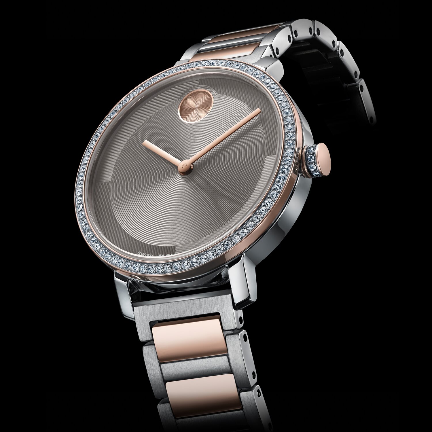 Rose gold tone and stainless steel BOLD Evolution 2.0 bracelet watch with crystal bezel.