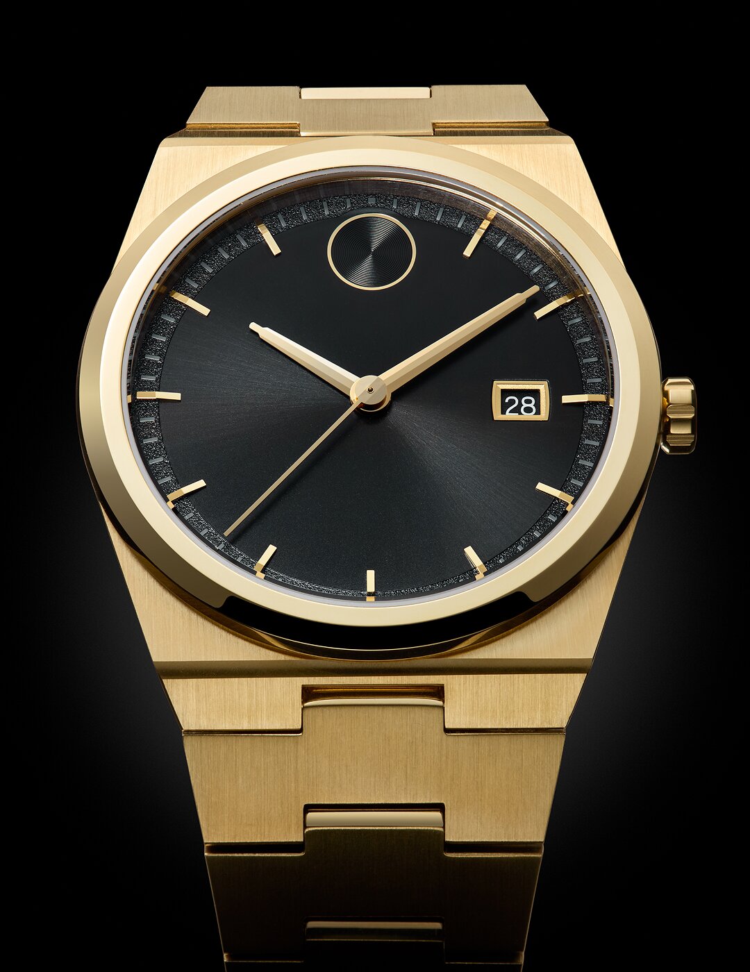 BOLD Quest watch with gold tone bracelet and black dial.