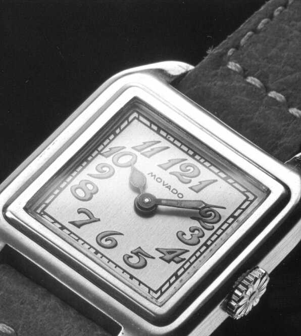 Original Heritage 1917 watch with brown strap and square beige dial.