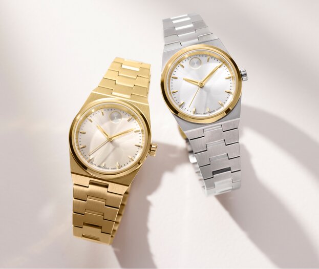 Gold tone BOLD Quest Mini bracelet watch next to the two tone BOLD Quest Mini bracelet watch.