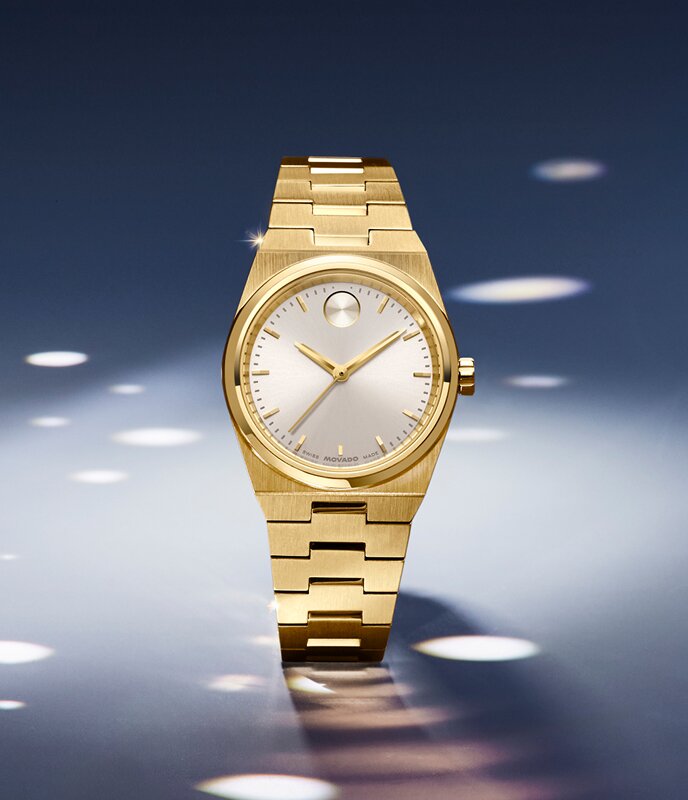 Gold tone BOLD Quest mini bracelet watch.