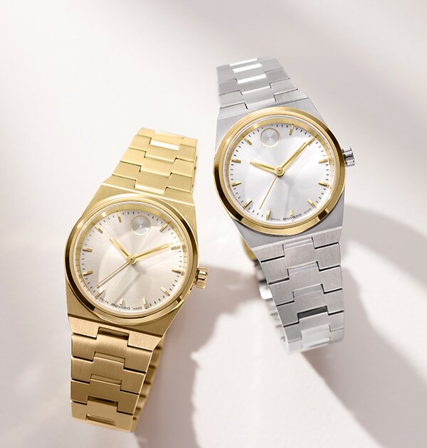 Gold tone BOLD Quest Mini watch next to silver BOLD Quest mini watch with gold tone accent.