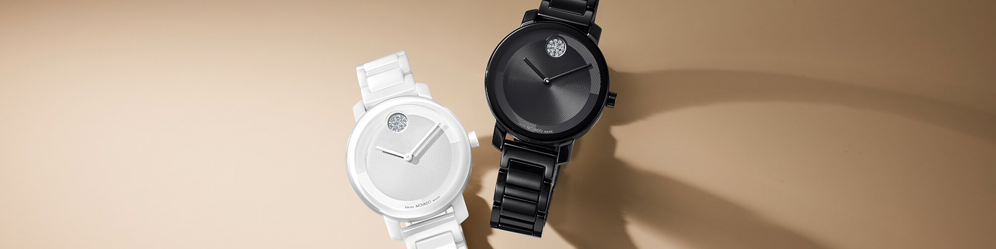 BOLD Evolution 2.0 bracelet watch in white ceramic next to a BOLD Evolution 2.0 bracelet watch in black ceramic.