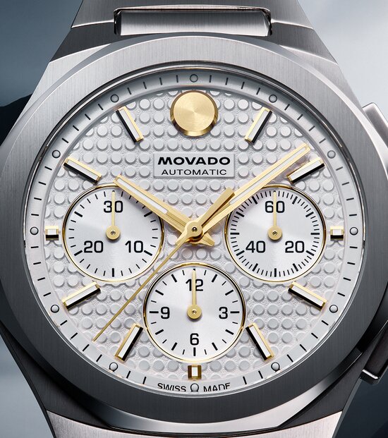 Close up of the Alta Centurion white Chronograph textured dial with gold accents.