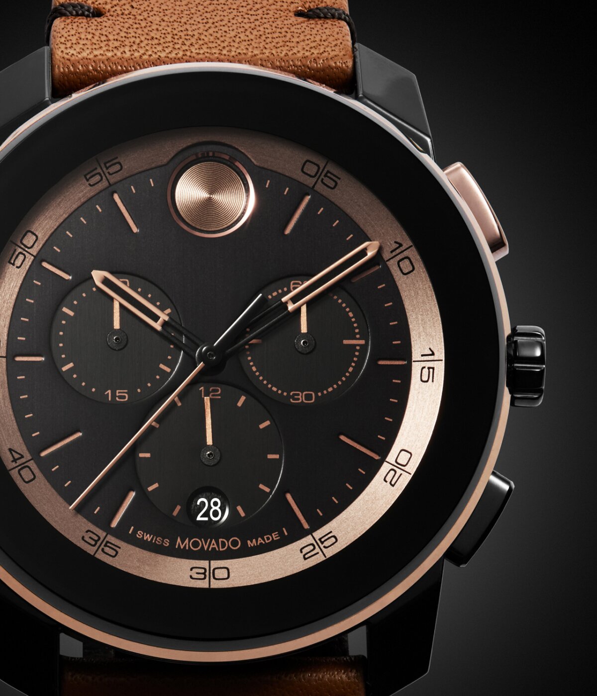 Zoomed in BOLD TR90 black chronograph dial with rose gold tone accents.