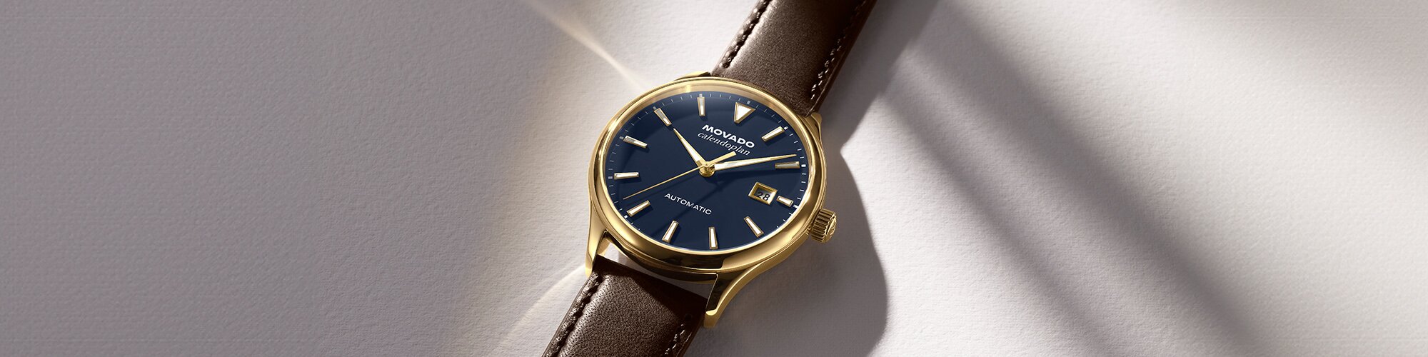 Heritage Calendoplan with brown leather strap and blue dial.
