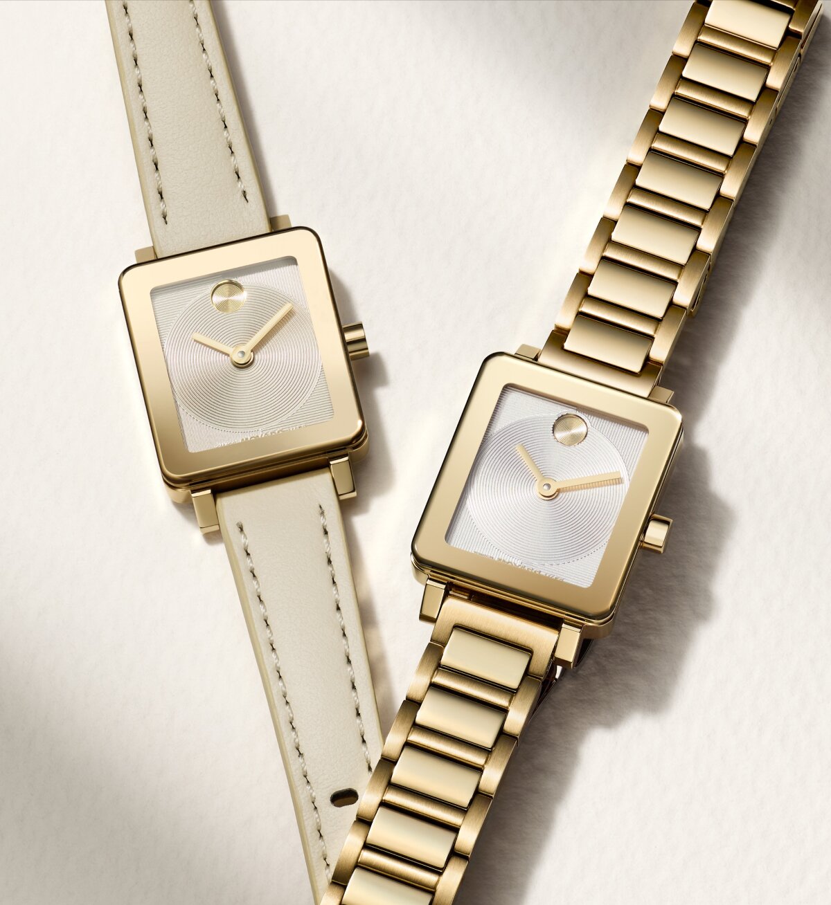 BOLD Evolution 2.0 Mini watch with tan leather strap and champagne dial and gold tone bracelet with white square dial. 