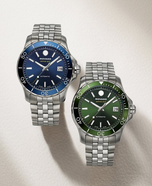 Two Series 800 bracelet watches with blue dial and green dial.