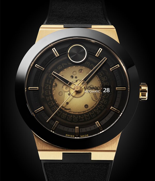 BOLD Fusion watch with black rubber strap and black skeleton dial with gold accents.