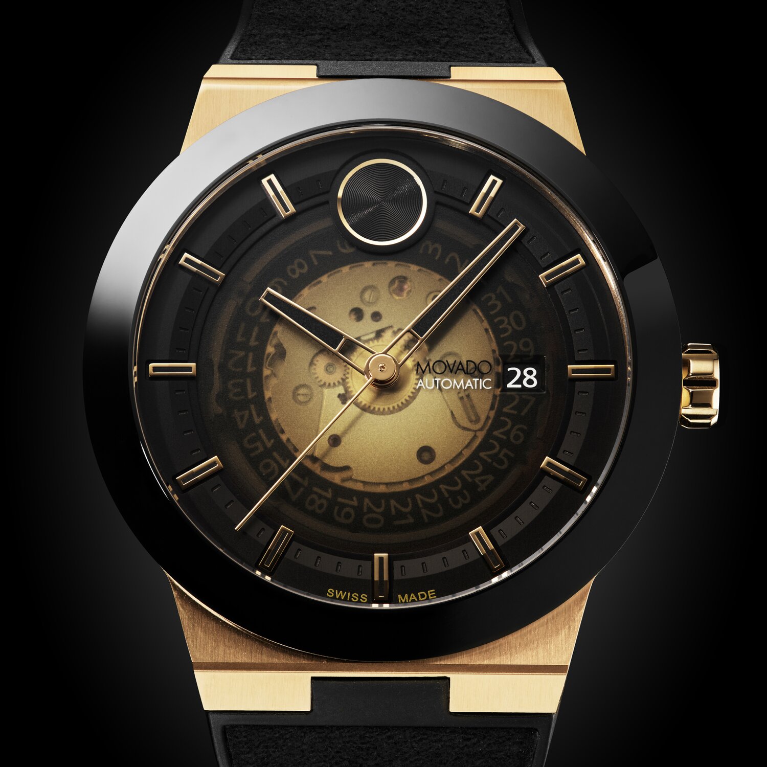 BOLD Fusion watch with black rubber strap and black skeleton dial with gold accents.