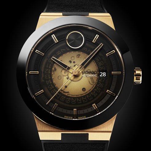 BOLD Fusion watch with black rubber strap and black skeleton dial with gold accents.
