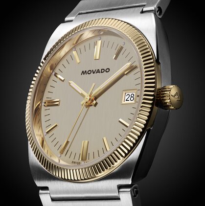 Heritage Ondoplan watch with stainless steel bracelet and gold tone dial.