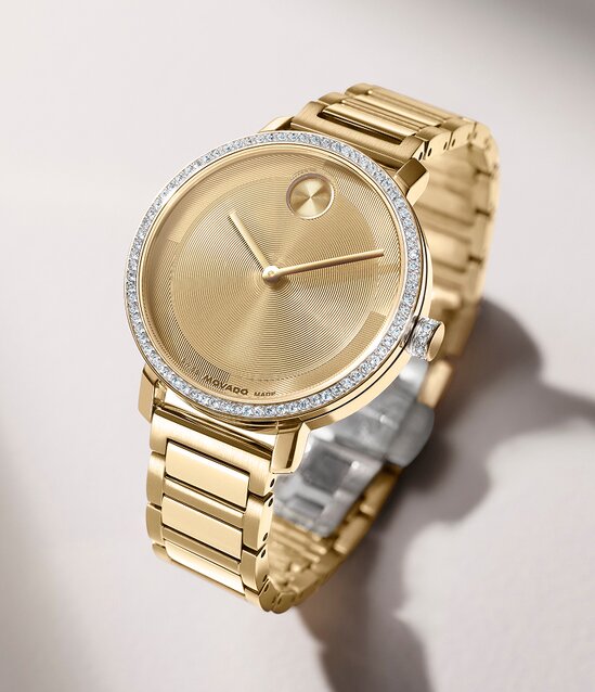 Gold tone BOLD Evolution 2.0 watch with crystal bezel.