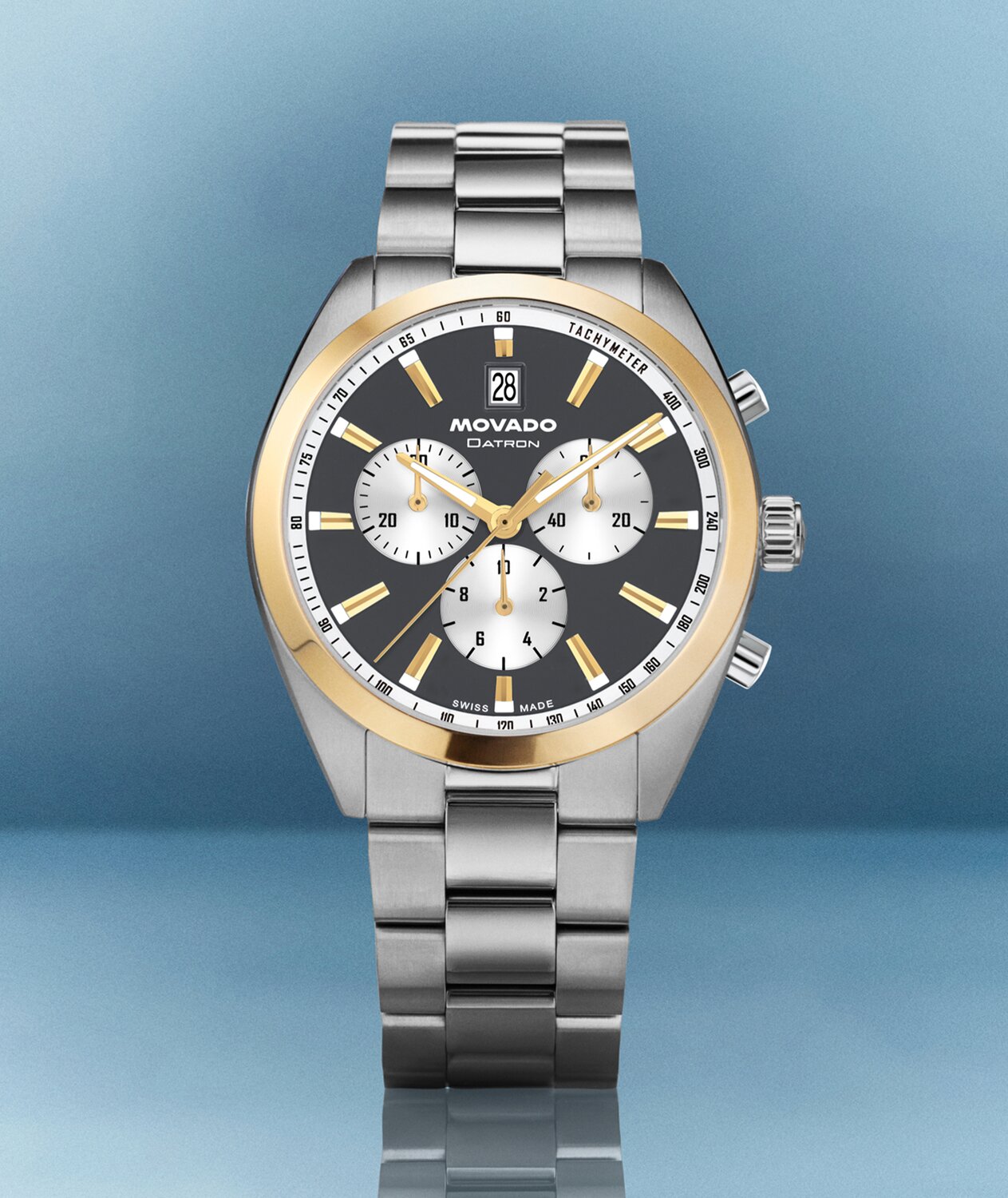 Heritage Series Datron watch with silver bracelet and blue chronograph dial with gold tone accents.