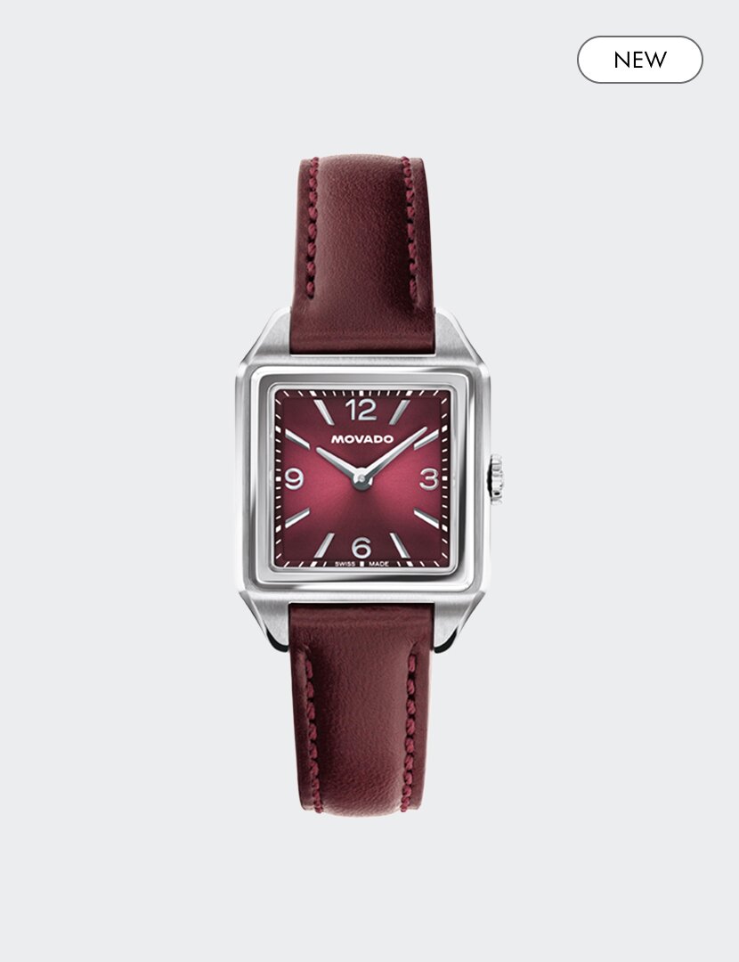 Heritage 1917 watch with cherry strap and cherry square dial and "new" badge in the top right corner.
