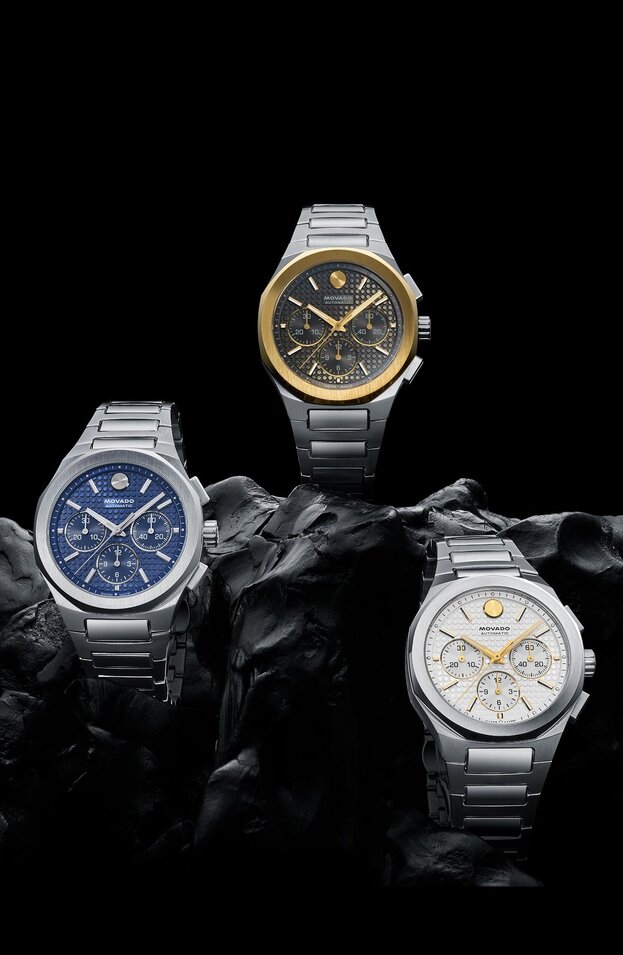 Three Alta Centurion Chronograph watches on a black rock.