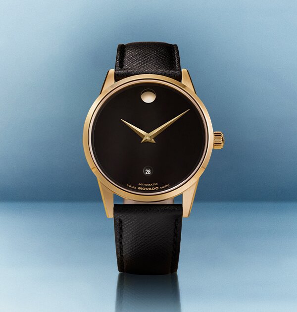 Museum Classic watch with black leather strap and black dial with gold accents