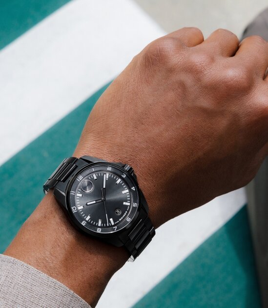 Man wearing the grey plated BOLD Verso S bracelet watch.