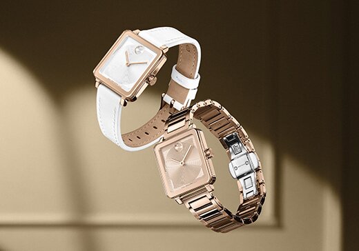 BOLD Evolution 2.0 with white leather strap and white dial next to a rose gold tone BOLD Evolution 2.0