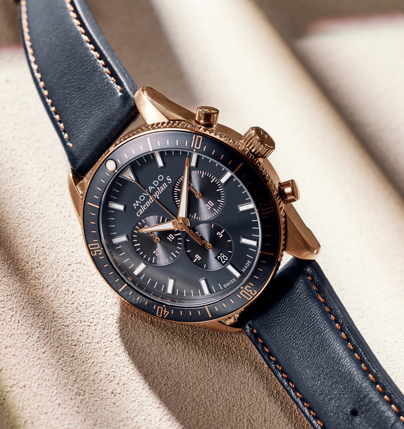 Heritage Series Calendoplan S watch with blue strap and blue chronograph dial with rose gold accents.