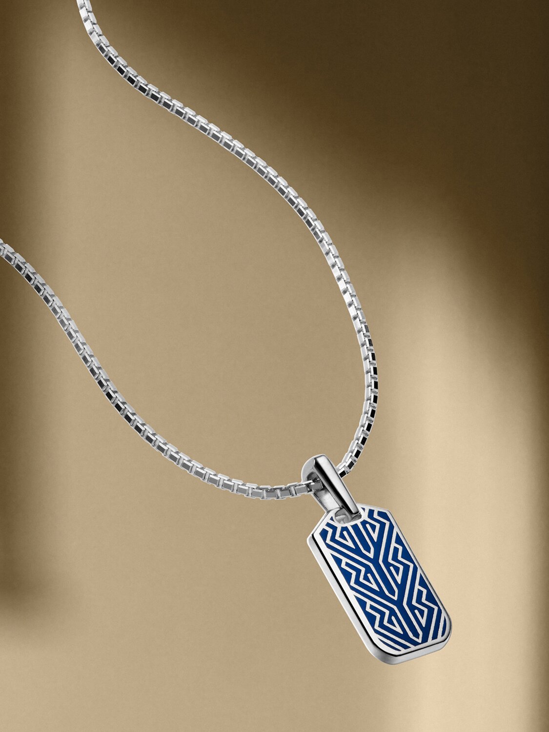 Men's silver chain necklace with blue chevron pendant.