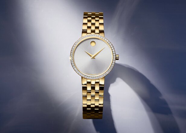 Museum Classic watch with gold tone bracelet and silver dial with lab grown diamond bezel
