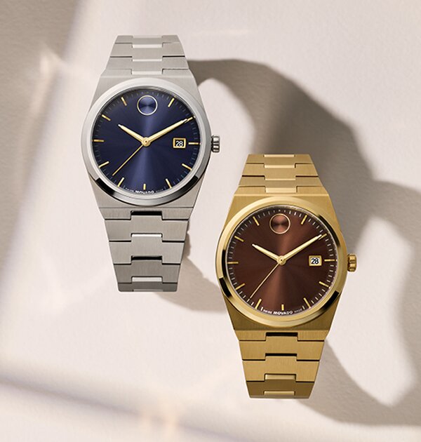 Stainless steel BOLD Quest bracelet watch with blue dial and gold tone BOLD Quest bracelet watch with brown dial.