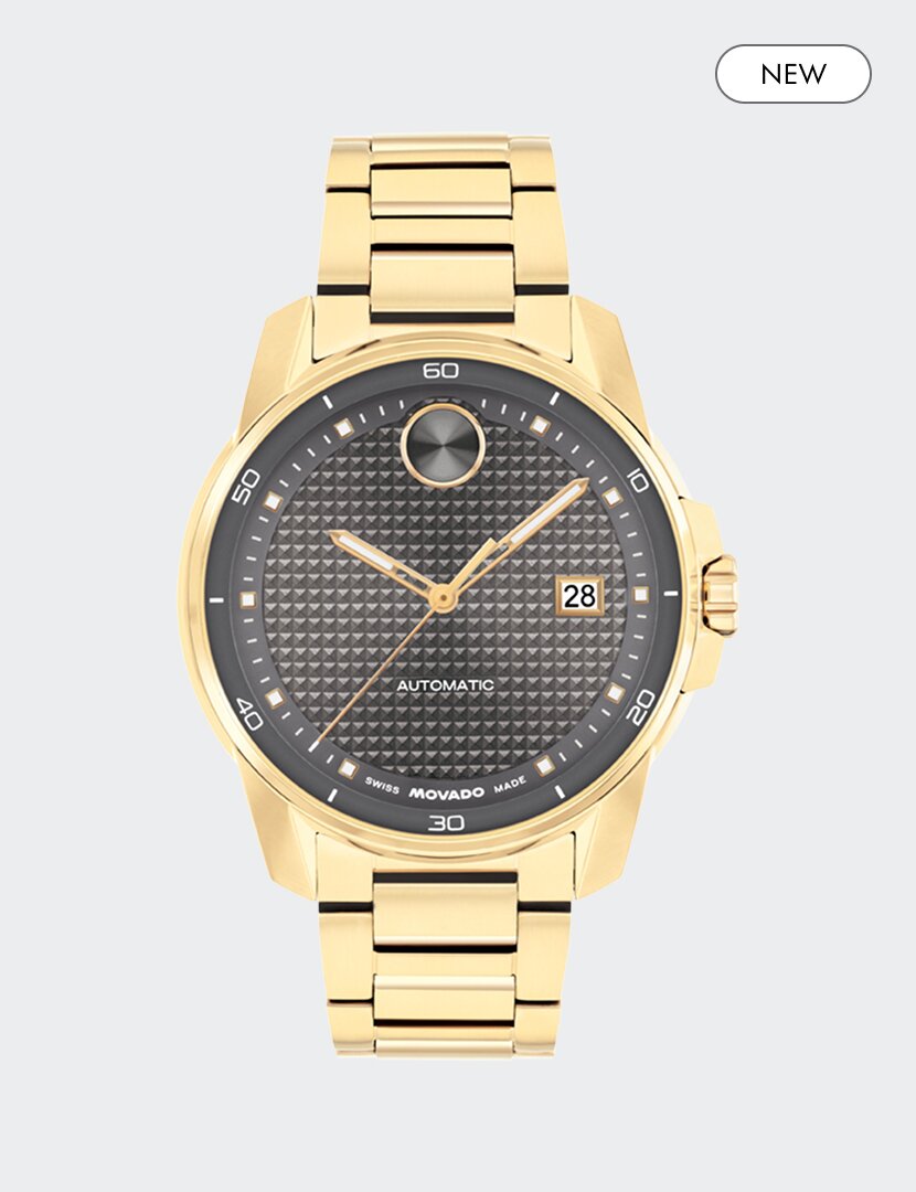 BOLD Verso Automatic  gold tone bracelet watch with grey dial and "new" badge in the top right corner.