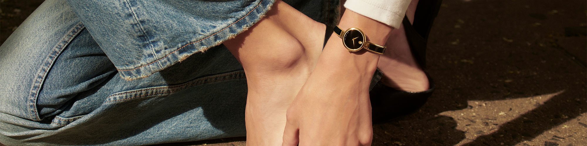 Black Moda bangle watch on a women's wrist