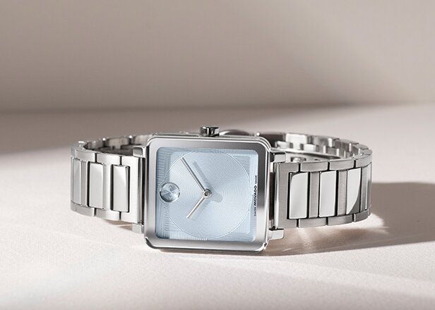 BOLD Evolution 2.0 watch with stainless steel bracelet and square blue dial.