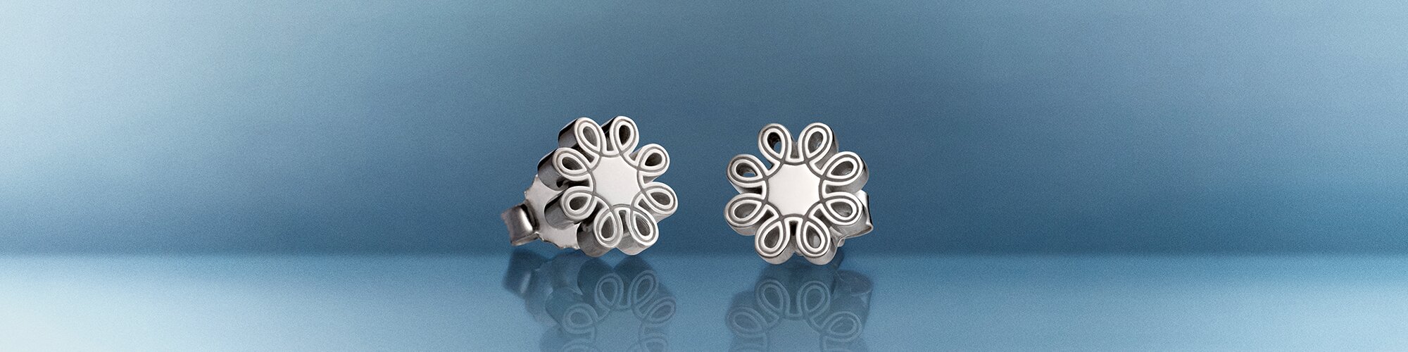 Silver Fleur stud earrings