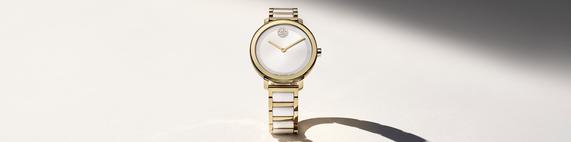 Gold tone and white ceramic BOLD Evolution 2.0 bracelet watch with crystal dot