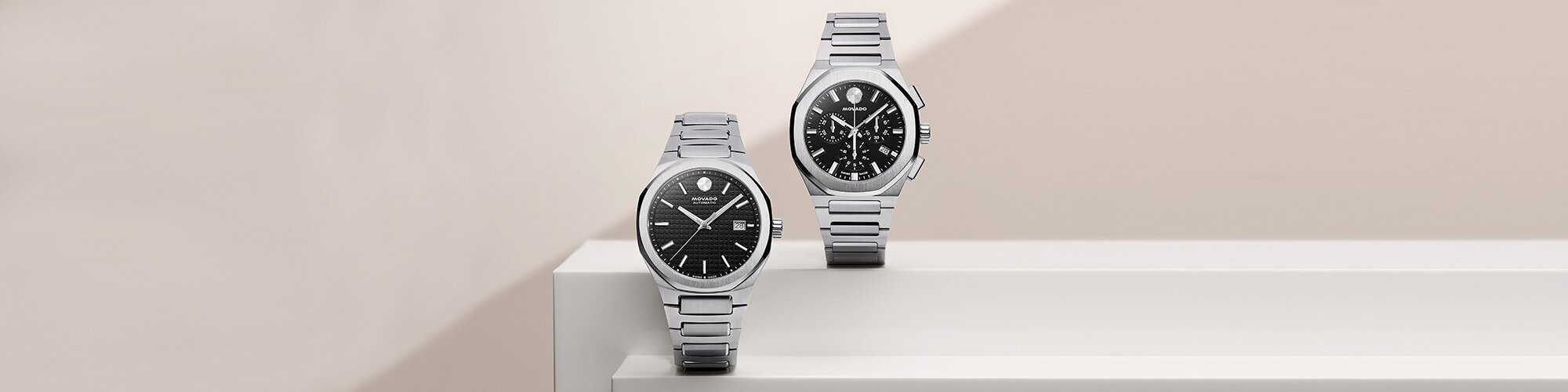 Stainless Steel Centurion Automatic and Centurion Chronograph bracelet watches with black dials.