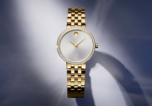 Museum Classic watch with gold tone bracelet and silver dial with lab grown diamond bezel
