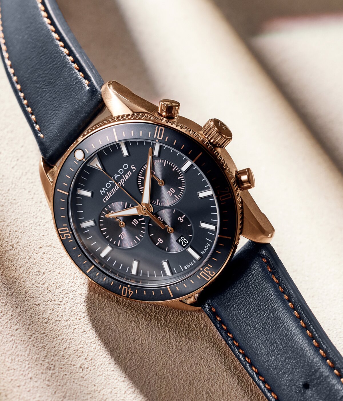 Heritage Series Calendoplan S watch with blue strap and blue chronograph dial with rose gold accents.