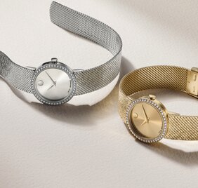 Silver Museum Velura watch with mesh strap and lab grown diamond bezel and gold tone Museum Velura watch with mesh bracelet and lab grown diamond bezel.