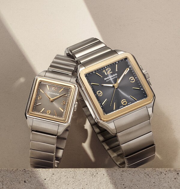 Men's and Women's Two tone Heritage 2927 bracelet watches leaning on one another.