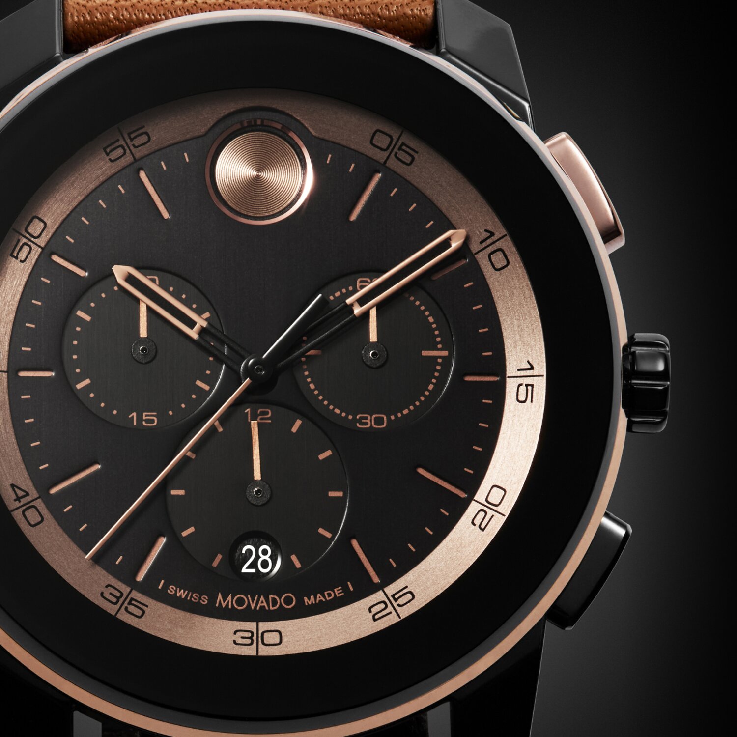 Zoomed in BOLD TR90 black chronograph dial with rose gold tone accents.