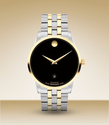 Museum Classic watch with two tone bracelet and black dial.